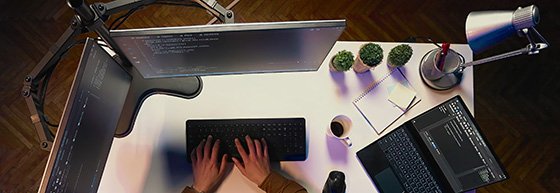 top-down view of someone coding